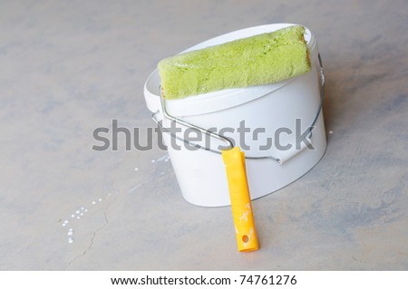 Home Improvement Paint Roller And Paint Tin
