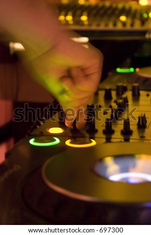 DJ tuning the sound (at a restaurant / bar in Lima, Peru)