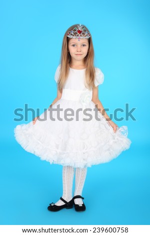 pretty little princess in the beautiful dress and diadem