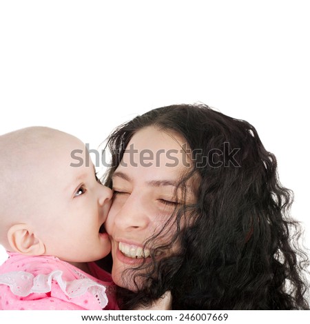 cute sweet little baby biting her pretty young mother