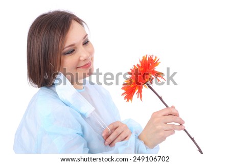 pretty young doctor with the red flower