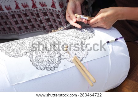 bobbin lace making outdoors closeup