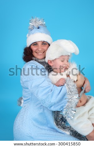 pretty young Snow Maiden with the cute little hare