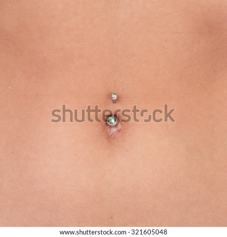 belly with the piercing closeup