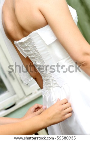 back side of a bride\'s corset
