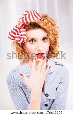 Portrait of surprised retro style woman/housewife.
