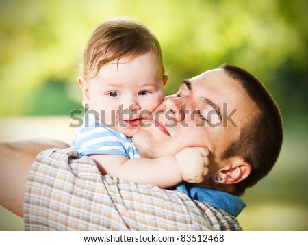 Father and son hugging each other