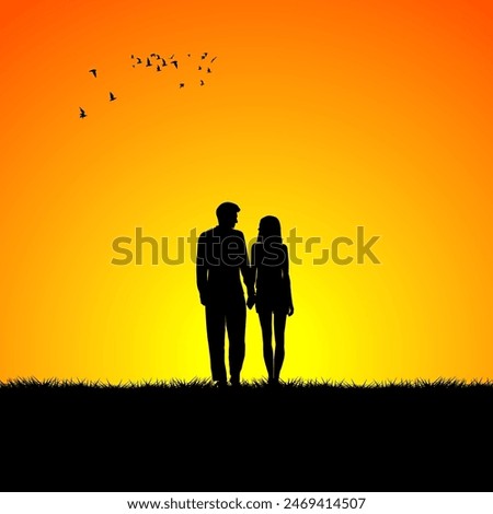 Silhouettes of a couple in love at sunset