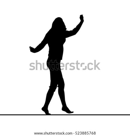 Woman silhouette balancing on slack line