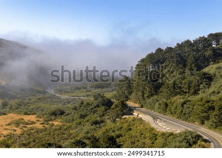 Similar – Foto Bild Malerische Aussicht vom grünen Hügel auf die Küste und die Stadt an einem sonnigen Tag in Spanien