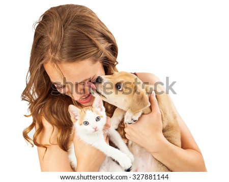 Similar – Image, Stock Photo Caucasian woman holding puppy. Adopted border collie dog held by a caucasian woman with long blond hair. Friendship and family.