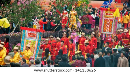 FOSHAN CITY - APRIL 12: To celebrate the birthday of Foshan City God Temple, Taoist believers hold the Chinese traditional ethnic culture tour, very lively scene April 12 , 2013 in Foshan, China