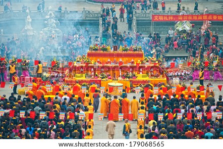 FOSHAN - Feb 25: Avalokitevara open days, warehouse, monks and believers held ceremonies at the foot of the mountain to pray for the people\'s health, national security Feb 25, 2014 in Foshan, China