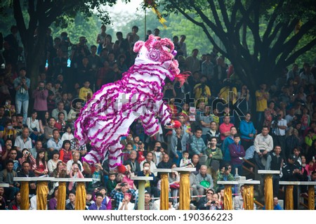 FOSHAN, CHINA Â?Â?MAY 1: 18 from around the China lion dance team came to the town of Xiqiao in 2 days of water lion championship, competition attracted many people to watch May 1, 2014 in Foshan, China