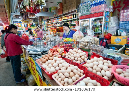 FoshanÃ¢Â?Â?Apr 13:People in the food market to buy fresh food, China pay attention to agricultural production in recent years, the marketof agricultural products is very rich April 13,2013 in Foshan,China