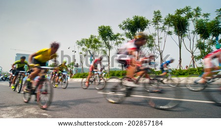 Foshana, China - June 22: In order to encourage citizens to exercise, Sports Bureau organized cycling competition, more than 600 people attended, June 22, 2014 in Foshan, China.