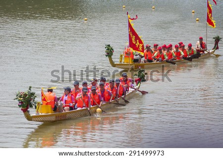 FOSHAN-June 27:If zhang town dragon boat Fen rivers, there are 47 men\'s, women\'s team took part in the game, there are tens of thousands of people watched the match June 27, 2015 in Foshan, China
