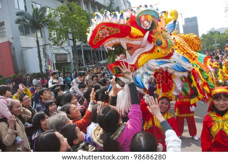 FOSHAN, MARCH 23: Dragon Dance In The Parade To Celebrate The Birthday Of Thetemple Of God, Foshan Temple Organized A Parade Of The Intangible Cultural Heritage March 23, 2012 in Foshan, China
