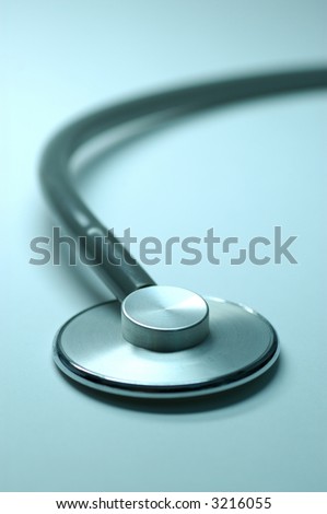 close-up of stethoscope isolated on blue background