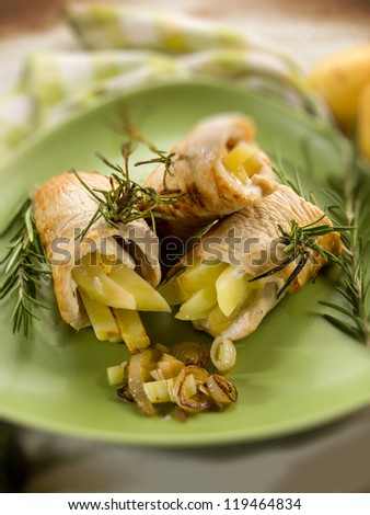 chicken stuffed with fried potatoes,  selective focus