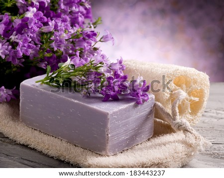 natural flower soap with scrub sponge spa concept