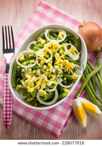 salad with boiled eggs green beans and onions