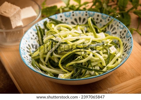 Similar – Foto Bild Hausgemachte Zucchini-Spaghetti mit Pestosauce, Brokkoli und Kirschtomaten