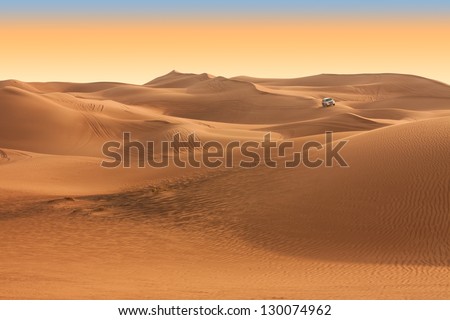 Desert safari on sunset with beautiful sky near Dubai. UAE