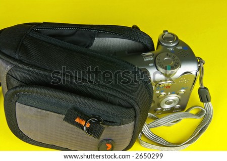 Compact digital camera and camera bag