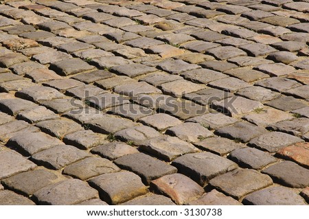 Close-up of cobblestone street in Chateau de Versailles, France