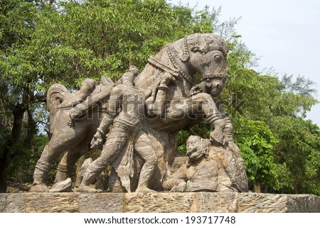 Sculpture of war horse crossing over soldier at Sun Temple, Konark, Orissa, India, Asia