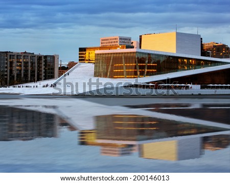OSLO, NORWAY - JUNE 1: National Oslo Opera House shines at sunrise on June 1, 2014. Oslo Opera House was opened on April 12, 2008 in Oslo, Norway