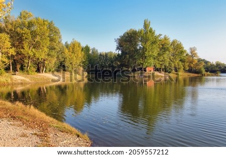 Lake reflection with tree in Sered, Slovakia Imagine de stoc © 