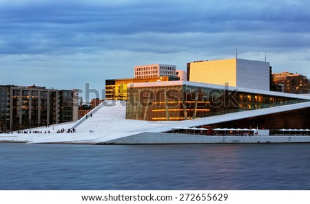 OSLO, NORWAY - JUNY 1: National Oslo Opera House shines at sunrise on Juny 1, 2014. Oslo Opera House was opened on April 12, 2008 in Oslo, Norway
