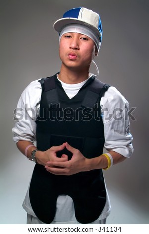 Gang member in a bullet proof vest.