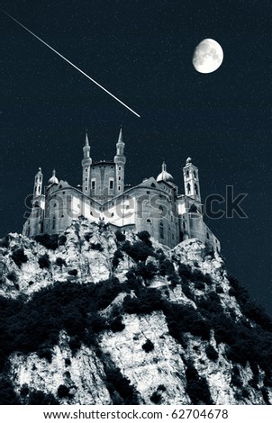 abstract castle on the rocks under the moon