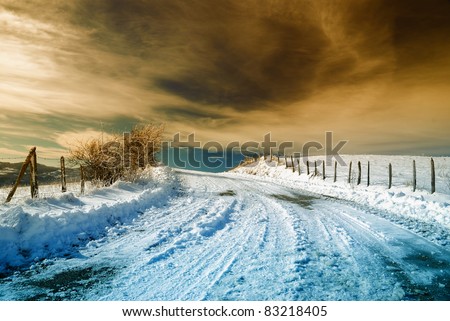 road with cool sunset and snow