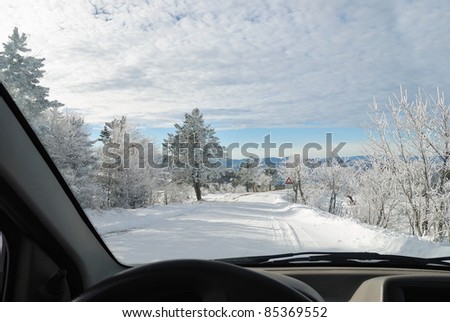 inside the car on snowy road
