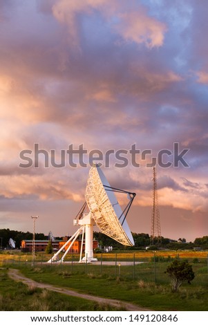 parabolic antenna on a military surveillance compound