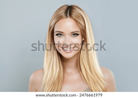 Similar – Image, Stock Photo Portrait of a beautiful young woman smiling