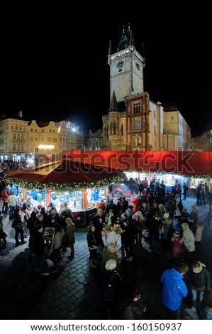 PRAGUE - DECEMBER 2: Christmas market on the Old Town Square at evening on December 2, 2011 in Prague, Czech Republic. The Old Town Square Christmas market is the prettiest and busiest one in Prague.