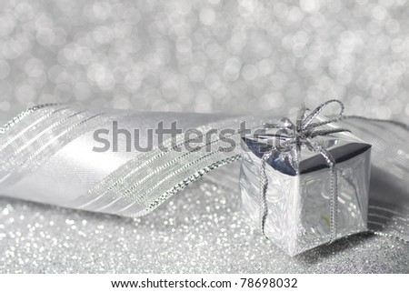 Christmas gift in silver with a ribbon