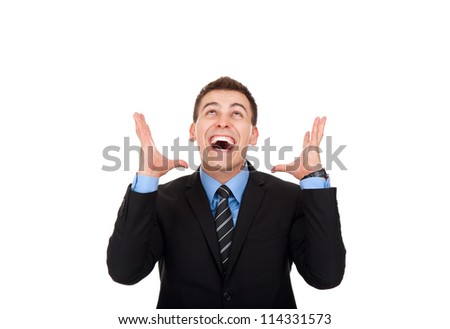 Successful excited business man happy smile looking up to empty copy space hold open palm, handsome young businessman with arms wide open, wear elegant suit and tie isolated over white background