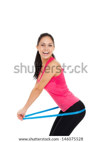 sport fitness woman excited smile measure hips ass with tape, young healthy perfect slim figure isolated over white background, concept of diet, weight loss cellulite