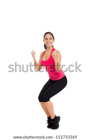 sport fitness woman excited happy smile hold yes ok hand gesture hold fist, young healthy smile girl perfect figure full length portrait isolated over white background