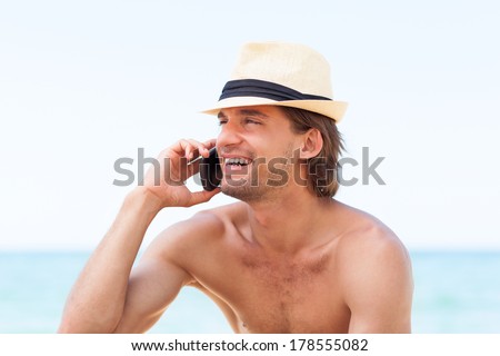 man cell phone call smile on beach summer vacation, Handsome young male wear hat, guy over sea blue sky, communication concept ocean holiday travel