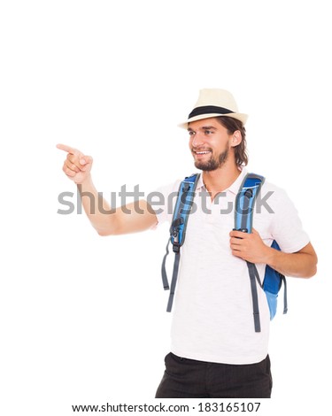 handsome man in hat with backpack point finger side show hand gesture with empty copy space, smile, concept of advertise travel summer vacation, isolated over white background