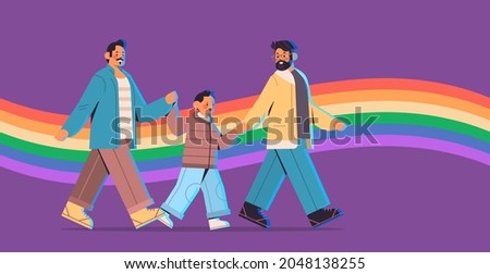 male parents walking with little son gay family transgender love LGBT community concept