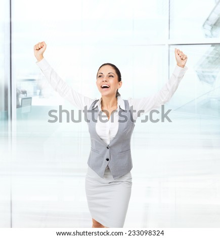 Business woman excited hold hands up raised arms, surprised happy smile business woman isolated over white background, concept winner success in modern office