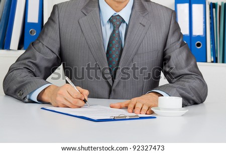 Businessman in elegant suits working with documents sign up contract, unrecognizable person sitting at the desk at office